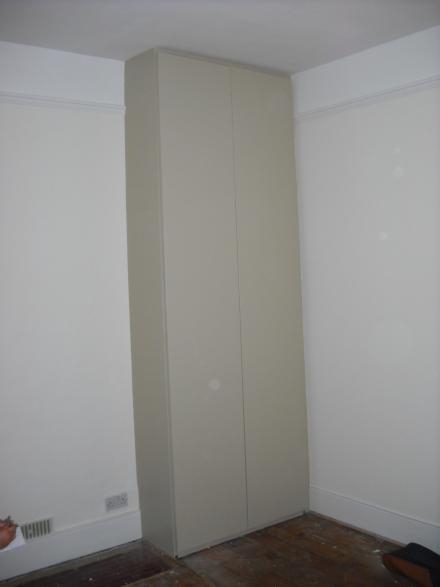 Floor to ceiling fitted wardrobe